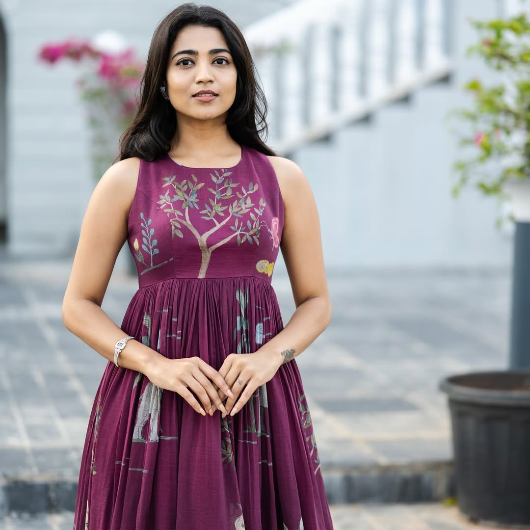 Bloom – Sleeveless Maroon Flared Dress with Nature-Inspired Embroidery